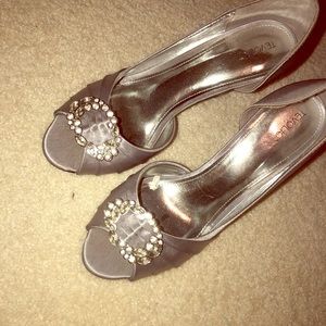 Silver shoes with silver buckles